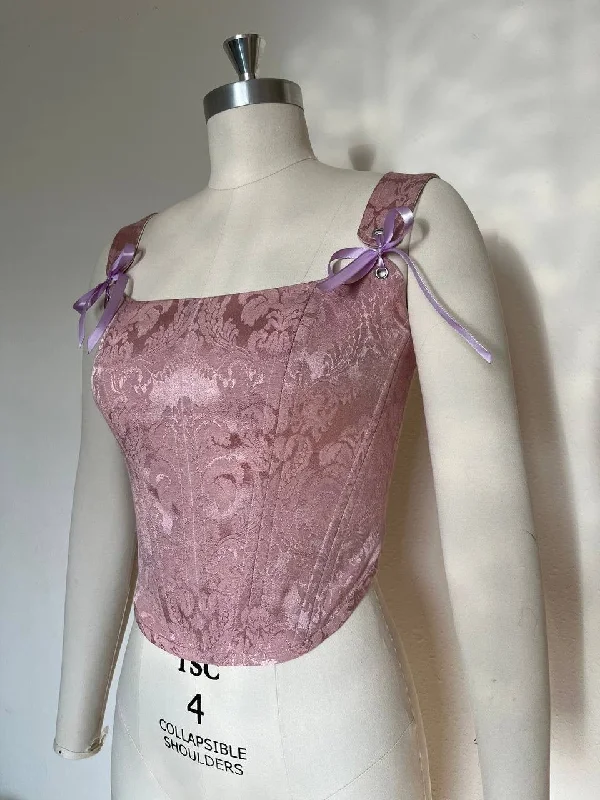 Multicolored bustiers with a vibrant and playful designPink corset with shoulder straps, size M-L