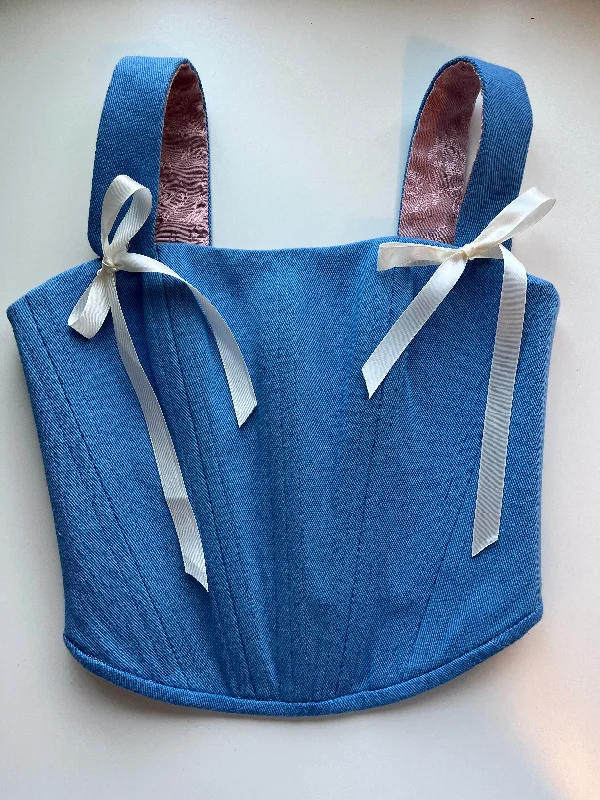 Pastel - colored corsets for a soft and feminine appealBlue denim corset with shoulder straps, size 2/XS -4/S Pastel - colored corsets for a soft and feminine appealBlue denim corset with shoulder straps, size 2/XS -4/S