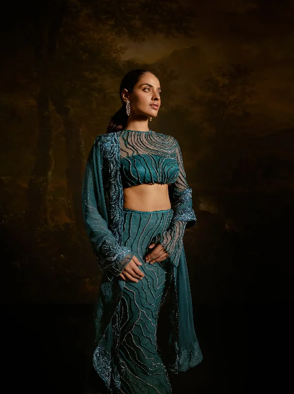 Ruffled Women Dress with Multiple Layers for a Playful and Girly Style Meera Teal Embroidered Lehenga Set